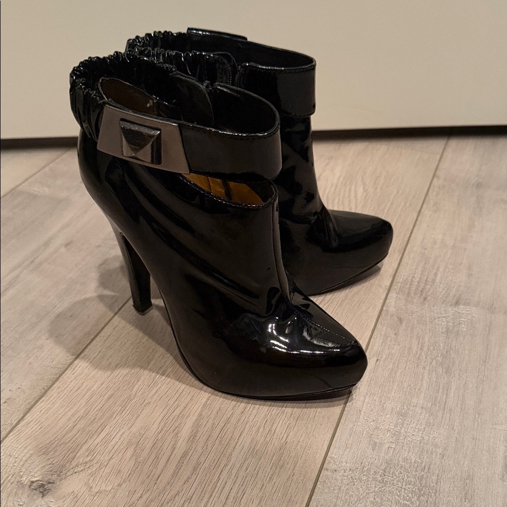 Report Sleek Black Patent Heeled Boots